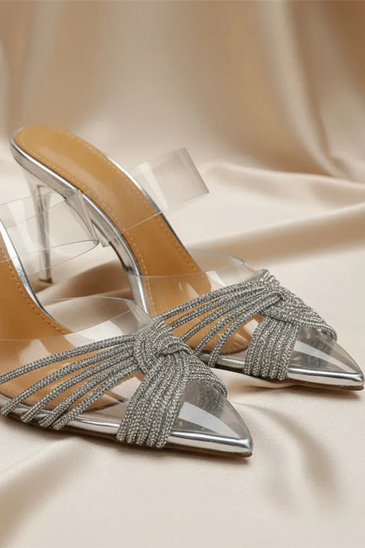 Silver crystal-embellished stiletto sandals with pointed toes and transparent straps