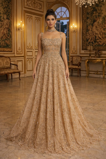 Woman in a gold evening gown standing in an opulent room with classical decor.